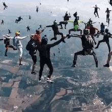 Skydiving People Are Awesome GIF - Skydiving People Are Awesome Holding Hands GIFs