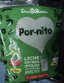 a green bag of por-nito leche entera polvo vitaminada