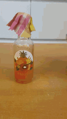 a bottle with a fruit design on the label