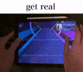 a person is playing a video game on a tablet with the words get real below them