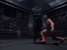 a man in a mask is being kicked by another man