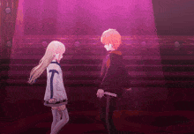a boy and a girl are standing next to each other in front of a purple background