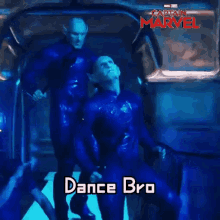a poster for captain marvel shows two men in blue suits dancing