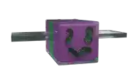 a purple cube with a green face on it is floating in the air