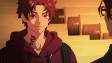 a man with a dragon tattoo on his neck is smiling