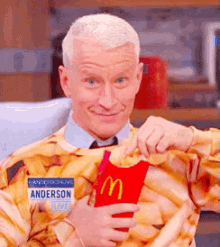 Anderson Cooper Eats Mcdonalds Fries Like Popcorn GIF - Anderson Cooper Mc Donalds Anderson Live GIFs