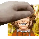 a hand is holding a picture of a man with a hat on his head