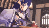 a girl in a kimono is holding a sword and cutting a piece of meat .