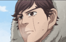 a close up of a person 's face with a furry hood