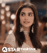 a star tamil chat logo with a woman in a white top