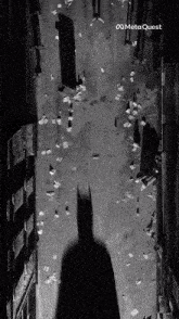 a black and white photo of a city street with a meta quest logo