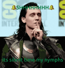 a picture of a man holding his finger to his lips with the words " its silent time my nymphs " above him