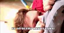 a man laying on a bed with the words eu so quero minha cama written on the bottom