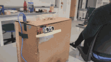 a cardboard box with a sticker on it that says ' a ' on it