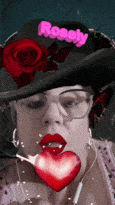 a woman wearing a black hat with the word rosely on it