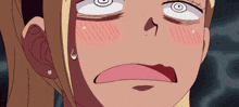 a close up of a girl 's face with a surprised expression