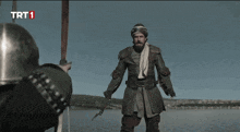 a person on a boat with trt1 on the bottom