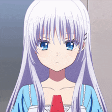 a girl with white hair and blue eyes is holding a red object