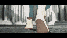 a person 's bare feet are shown in a video