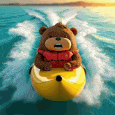 a teddy bear wearing a life vest is riding a banana boat in the ocean