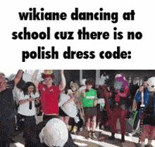 a group of people are dancing in front of a sign that says wikiane dancing at school cuz there is no polish dress code :