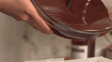 Pouring The Melted Chocolate Two Plaid Aprons GIF - Pouring The Melted Chocolate Two Plaid Aprons Putting The Melted Chocolate GIFs