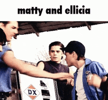 a group of people are standing in front of a sign that says matty and elicia