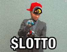 a man in a suit and red hat is holding pool balls in front of a sign that reads $ lotto