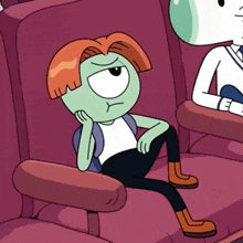 a green cartoon character with red hair is sitting in a red chair