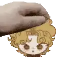 a person is putting a slipper on a girl 's head .
