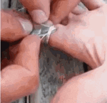 How To Remove A Stuck Ring GIF - Stuck Ring Remove String GIFs