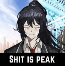 a man in a suit and tie is crying with the words `` shit is peak '' behind him .