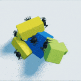 a bunch of blocks with spiders on them including a blue block