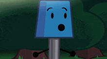 a lamp and a stack of blue sticks with a face