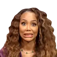 a woman with curly hair making a funny face with her mouth open