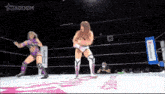 two women are wrestling in a ring with the words stardom on the bottom