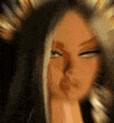 a close up of a woman 's face with a blurry background
