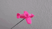 pink plane toy fly