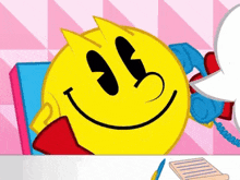 a pac man talking on a phone with a speech bubble