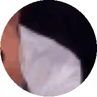 a close up of a person 's face is shown in a circle