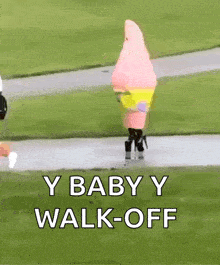 a person in a spongebob costume walks down a path