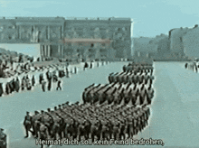 a group of soldiers marching in a line with the words " heimat dich soll kein feind bedrohen " written below them