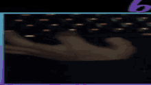a person is typing on a keyboard with a purple number 6 in the corner
