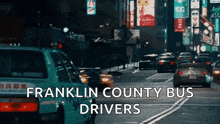 a franklin county bus driver is driving down a city street