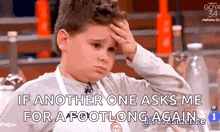a young boy with a chef 's apron is holding his head and says if another one asks me for a footlong again