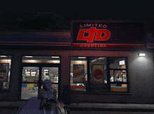 a limited ltd gasoline store with a purple car parked outside