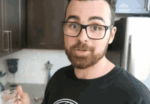 Fit Couple Cooks Sip GIF