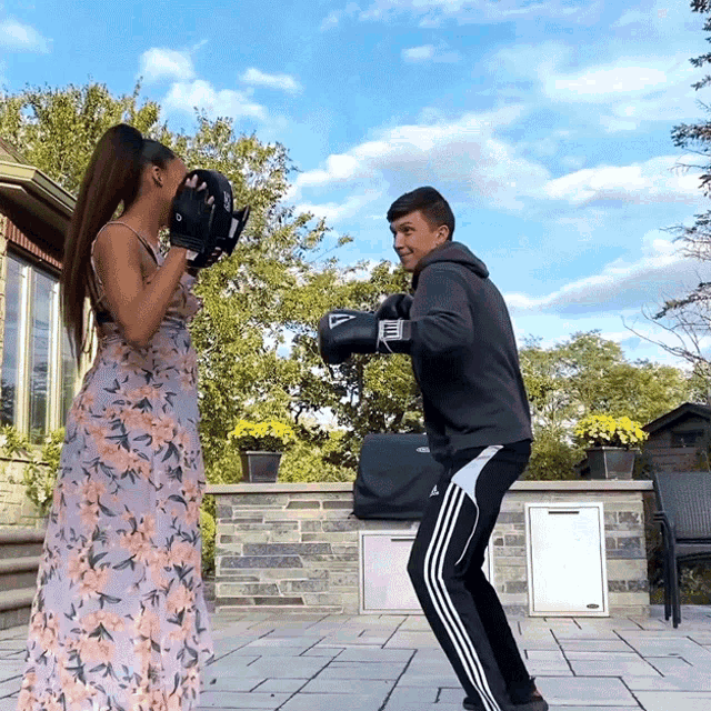 Punching Pads Hailey Laine GIF - Punching Pads Hailey Laine Matt Tusiek GIFs