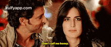 a man is kissing a woman on the cheek while she says don 't call me honey .
