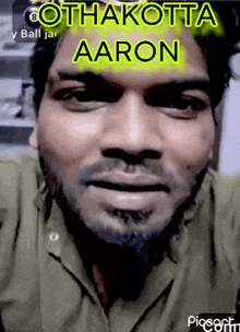 a man with the name aaron on the top of his face